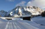 Experience the serenity of mountain living in this stunning winter landscape.