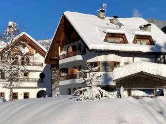 Discover the charm of this stunning property nestled in a winter wonderland.