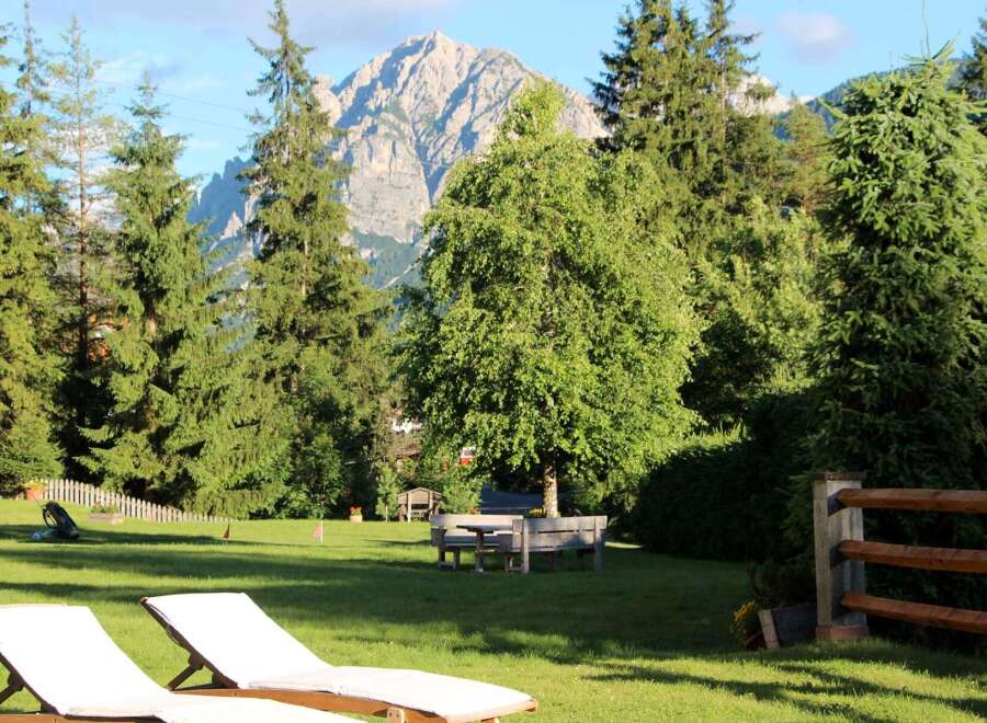 Escape to this stunning property surrounded by lush greenery and breathtaking mountain views.