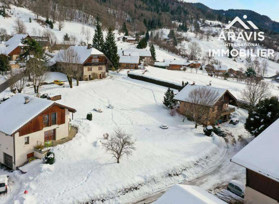Discover a charming winter retreat nestled in a picturesque snowy landscape.