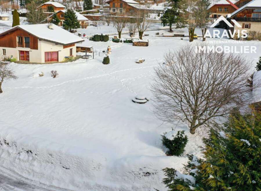 Discover this charming property nestled in a serene, snow-covered landscape.