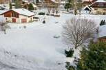 Discover this charming property nestled in a serene, snow-covered landscape.