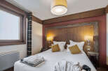 Experience the epitome of comfort and style in this inviting bedroom.
