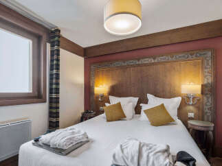 Experience the epitome of comfort and style in this inviting bedroom.