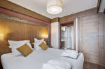 Experience luxury and comfort in this beautifully designed bedroom.