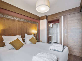 Experience luxury and comfort in this beautifully designed bedroom.