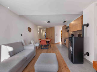 This stunning property boasts a modern open-plan living space, perfect for entertaining.
