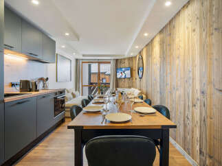 Experience the charm of this stunning property, featuring a beautifully designed dining area perfect for entertaining.