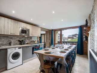 This stunning kitchen and dining area is the perfect space for entertaining.