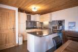 This stunning kitchen boasts a modern design with a touch of rustic charm.