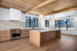This stunning kitchen boasts a modern design with high-end finishes.