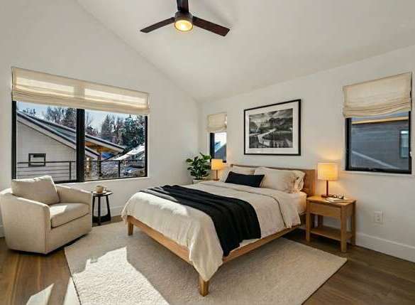 This stunning bedroom boasts a modern design with a cozy ambiance.