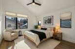 This stunning bedroom boasts a modern design with a cozy ambiance.