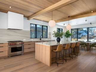 This stunning kitchen boasts a modern design with high-end finishes.
