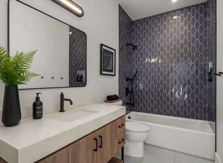 Step into a modern oasis with this stunning bathroom design.