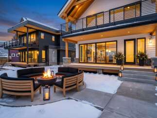 Experience luxury mountain living in this stunning modern home, perfect for entertaining year-round.