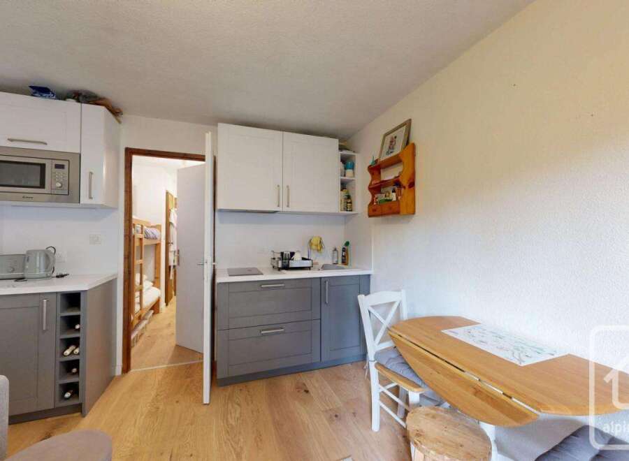 Discover this charming property featuring a well-equipped kitchen with modern appliances and ample storage.