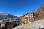 Discover a stunning property nestled in a picturesque mountain setting.