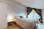 Discover the charm of this cozy bedroom, perfect for a peaceful retreat.