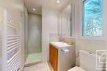 This modern bathroom features a sleek design with a minimalist aesthetic.