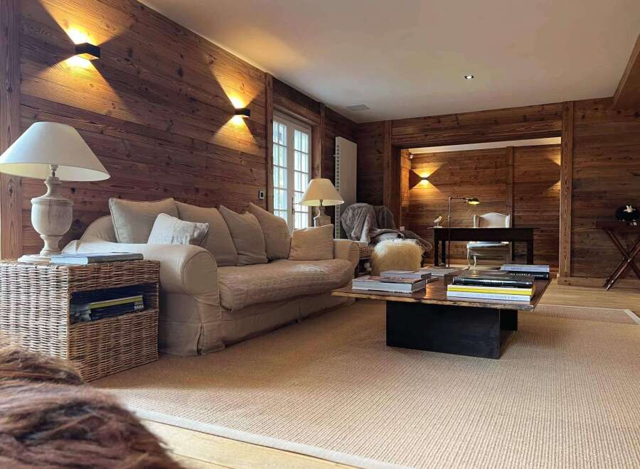 This stunning property boasts a warm and inviting living space, perfect for relaxation and entertaining.