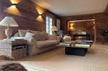 This stunning property boasts a warm and inviting living space, perfect for relaxation and entertaining.