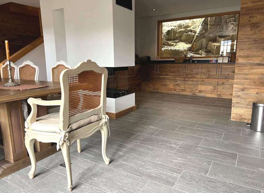 This stunning property boasts a unique blend of rustic charm and modern elegance.