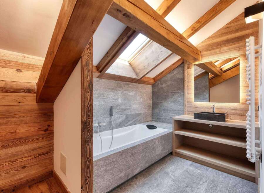 This stunning bathroom features a luxurious design with a modern touch.
