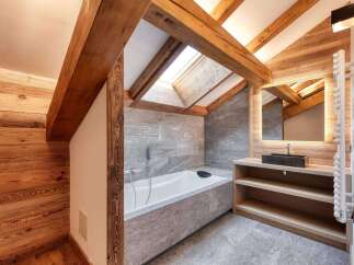 This stunning bathroom features a luxurious design with a modern touch.