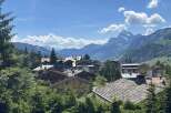 Nestled in a picturesque mountain village, this property offers stunning views of the surrounding peaks and lush greenery.