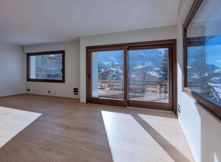 This stunning property boasts a bright and airy living space, perfect for enjoying the breathtaking mountain views.