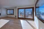This stunning property boasts a bright and airy living space, perfect for enjoying the breathtaking mountain views.