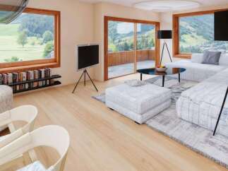 Experience luxury living in this stunning property, featuring expansive windows that frame breathtaking mountain views.