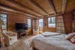 Experience the ultimate mountain retreat in this cozy bedroom.