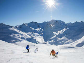 Experience the ultimate winter getaway with this stunning property nestled amidst the majestic snow-capped mountains.