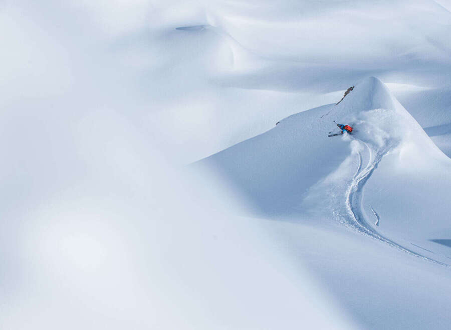 Experience the thrill of winter in this stunning mountain landscape.