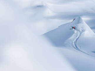 Experience the thrill of winter in this stunning mountain landscape.