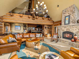 Step into rustic luxury with this stunning log cabin home.