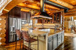 This stunning kitchen boasts a rustic yet modern design, perfect for entertaining and everyday living.
