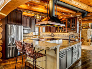 This stunning kitchen boasts a rustic yet modern design, perfect for entertaining and everyday living.