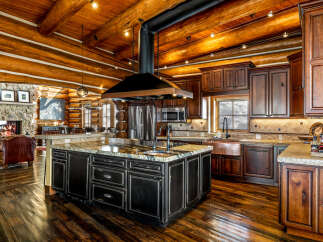This stunning kitchen boasts a rustic yet elegant design, perfect for a luxurious home.