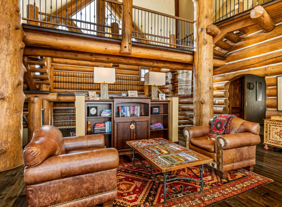 Step into rustic luxury with this stunning log cabin home.