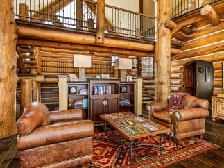 Step into rustic luxury with this stunning log cabin home.
