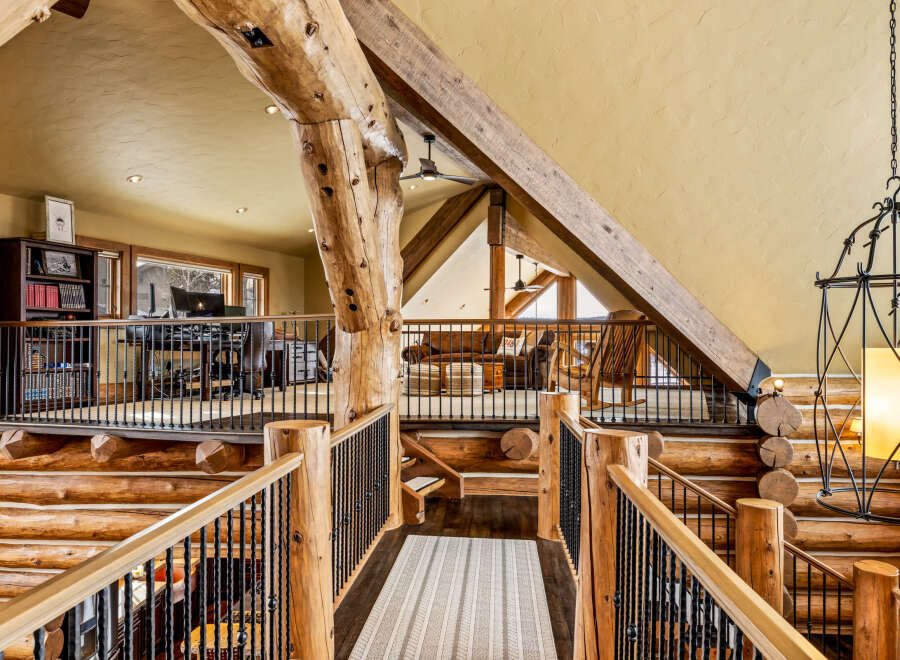 Step into rustic elegance with this stunning log home.