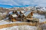This stunning mountain home offers luxurious living with breathtaking views.