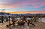 Enjoy breathtaking mountain views from this stunning outdoor living space.