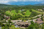 Discover luxury living in this stunning property with breathtaking views of a lush golf course and serene lake.