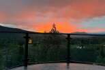 Enjoy breathtaking sunsets from this stunning property! This home features a spacious outdoor area perfect for entertaining or relaxing.