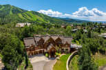 This stunning mountain home offers luxurious living with breathtaking views.