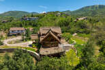 Nestled in a serene mountain landscape, this stunning property offers unparalleled views and luxurious living.